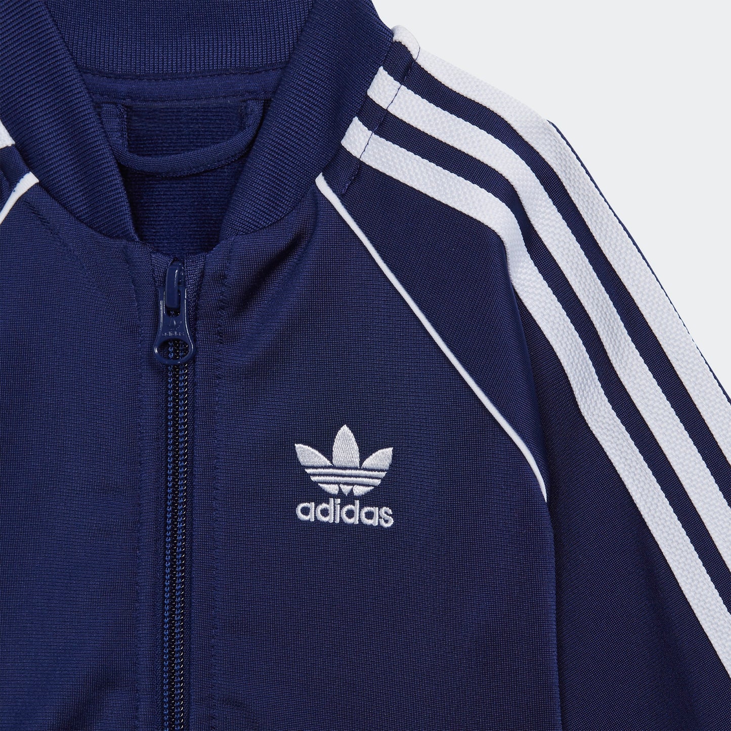 TUTA INFANT ADICOLOR SST