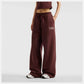 PANTALONI DONNA NEW BALANCE TRACKSIDE FLEECE JOGGERS – BORDEAUX