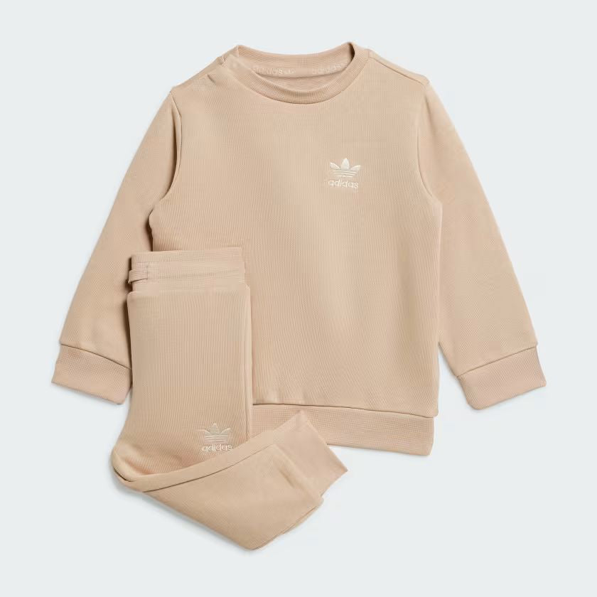 TUTA INFANT ESSENTIAL LOGO