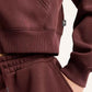 FELPA DONNA NEW BALANCE TRACKSIDE FLEECE FULL ZIP – BORDEAUX