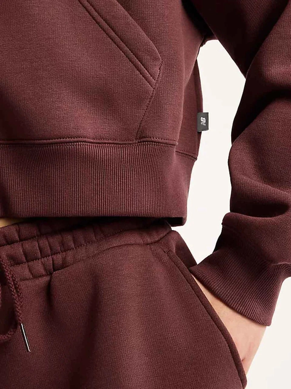 FELPA DONNA NEW BALANCE TRACKSIDE FLEECE FULL ZIP – BORDEAUX