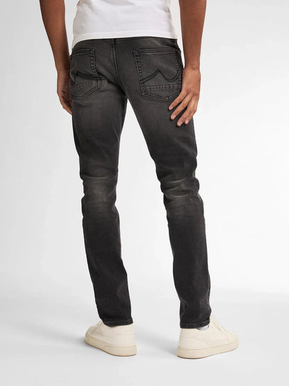 JEANS SLIM FIT UOMO PETROL INDUSTRIES SEAHAM EVERGLADES IN COTONE BIOLOGICO – BLACK STONE/ GRIGIO SCURO