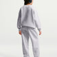 PANTALONI RAGAZZA NIKE STUDIO FLEECE AMPI – GRIGIO
