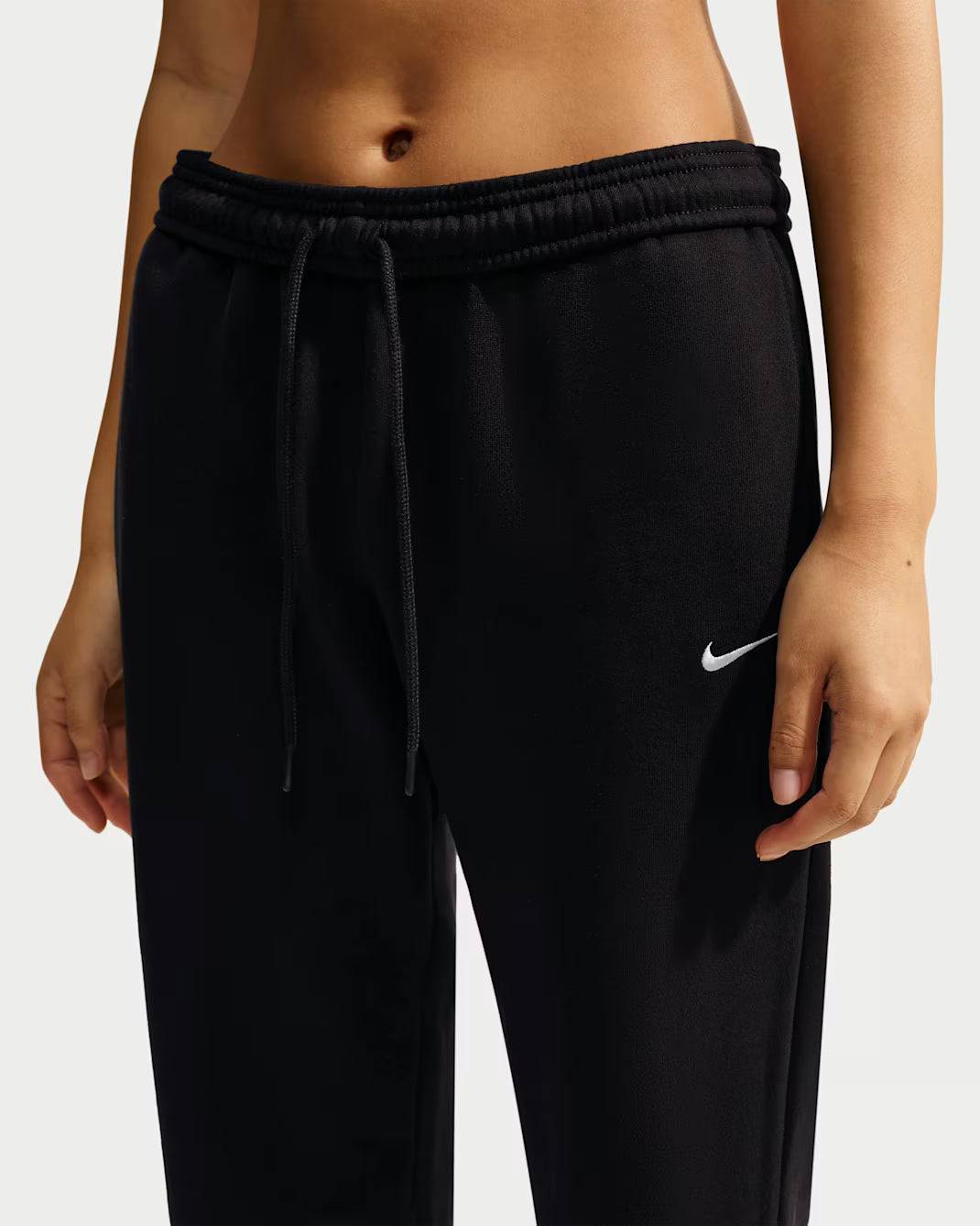 PANTALONI DONNA NIKE STUDIO FLEECE BORDO APERTO – NERO