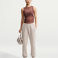 PANTALONI TUTA DONNA NIKE STUDIO LOGO FLEECE – BEIGE