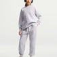 PANTALONI RAGAZZA NIKE STUDIO FLEECE AMPI – GRIGIO