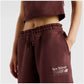 PANTALONI DONNA NEW BALANCE TRACKSIDE FLEECE JOGGERS – BORDEAUX