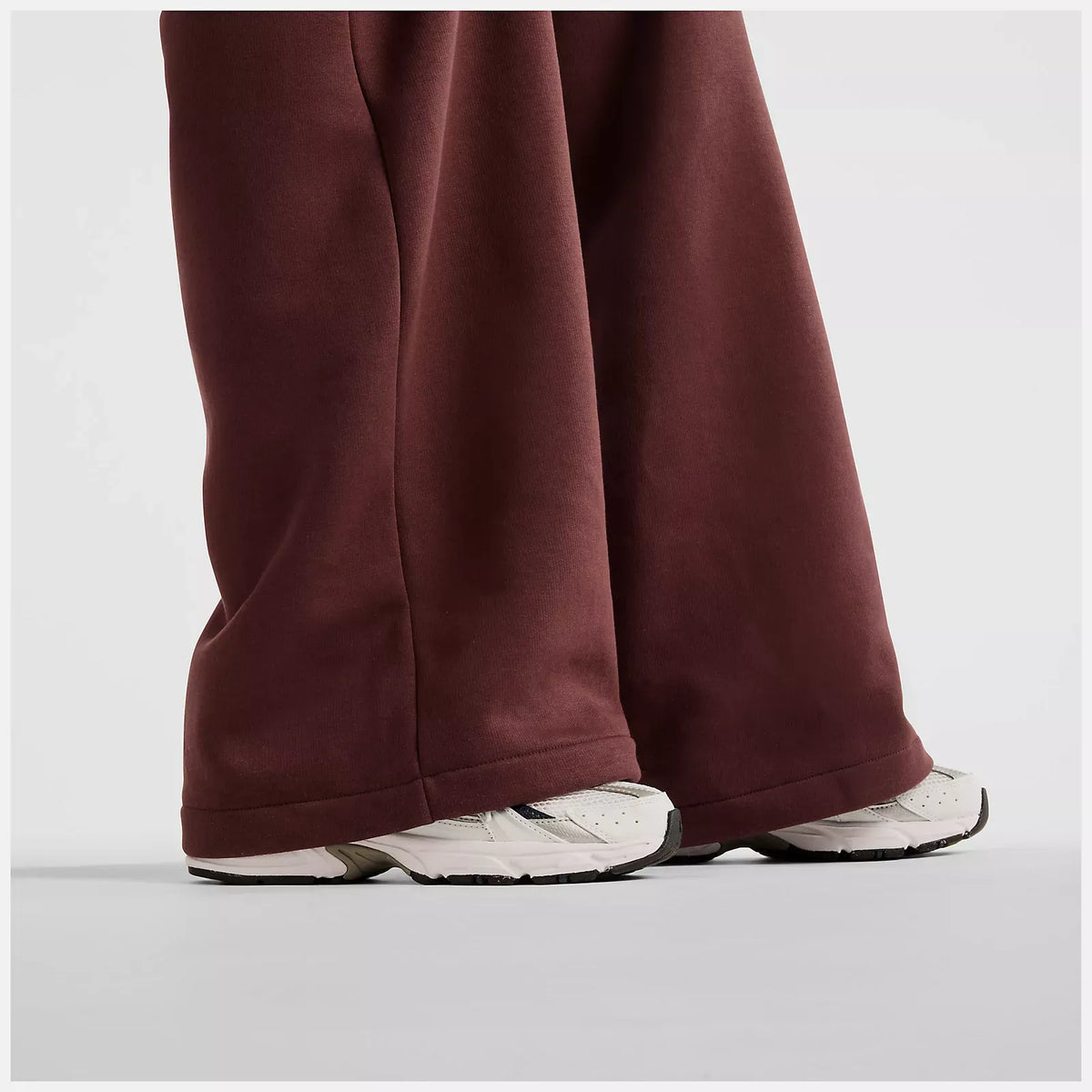 PANTALONI DONNA NEW BALANCE TRACKSIDE FLEECE JOGGERS – BORDEAUX