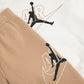 TUTA NEONATO JORDAN SWOOSH FLEECE SET – BIANCO/BEIGE